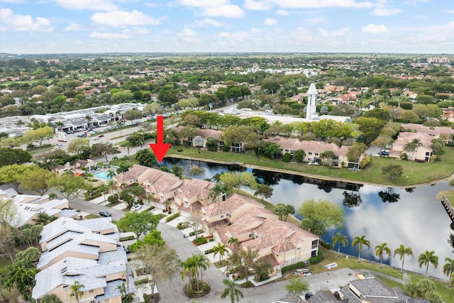 aerial view featuring a water view and a residential view