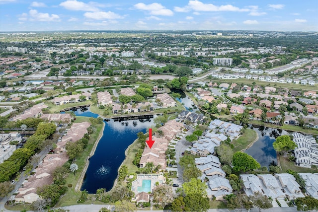 bird's eye view with a water view and a residential view