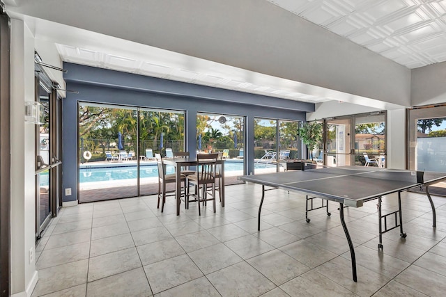 rec room featuring tile patterned flooring