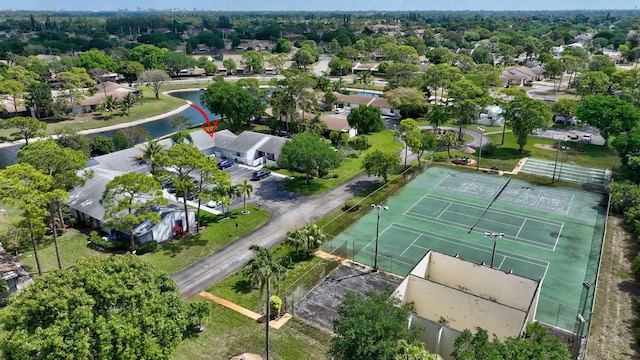 birds eye view of property with a residential view