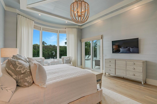 bedroom with a notable chandelier, recessed lighting, baseboards, access to exterior, and light wood finished floors