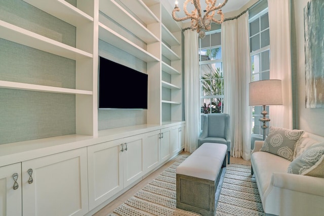 living room featuring a chandelier