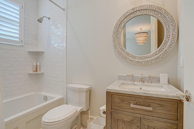 bathroom with toilet, bathtub / shower combination, and vanity