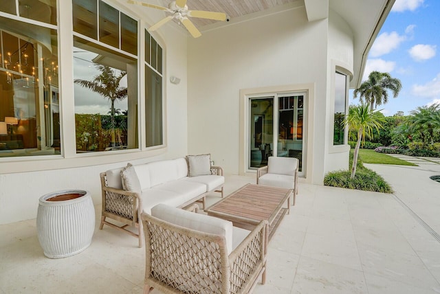 view of patio featuring an outdoor living space and a ceiling fan