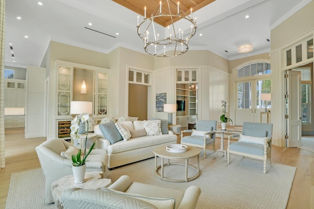 living room with light wood-style floors, recessed lighting, and french doors