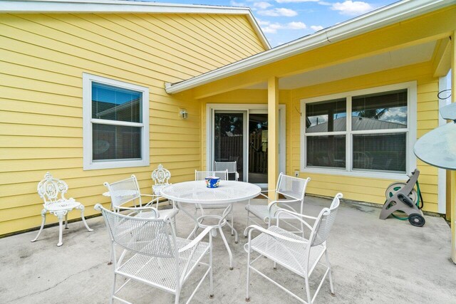 view of patio / terrace with a fenced backyard and outdoor dining area