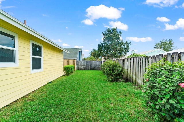 view of yard featuring a fenced backyard