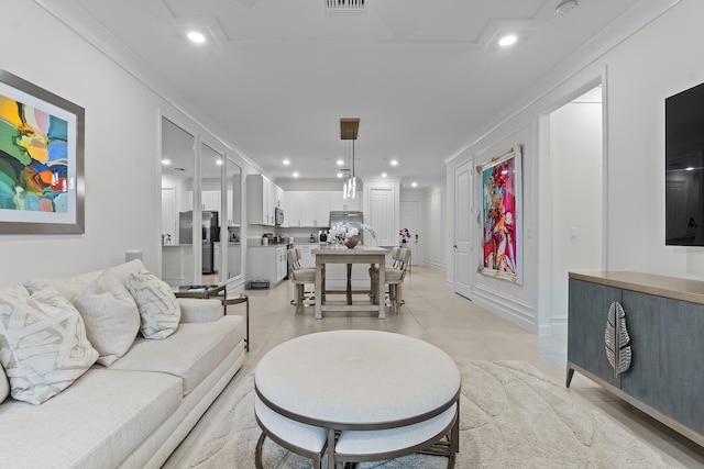 living area with recessed lighting, light tile patterned flooring, crown molding, and visible vents