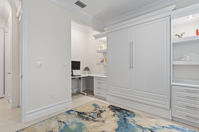 bedroom featuring light tile patterned floors, baseboards, visible vents, and built in study area