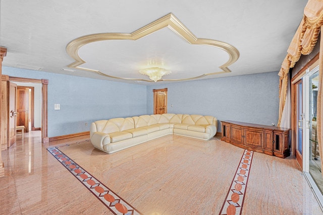 unfurnished living room with baseboards