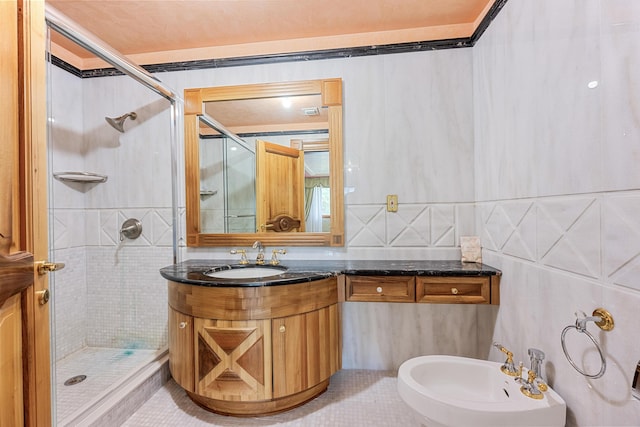 bathroom with tile patterned flooring, vanity, tile walls, a shower stall, and a bidet