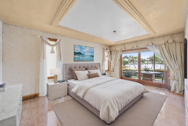 bedroom featuring wallpapered walls, access to outside, baseboards, and a raised ceiling