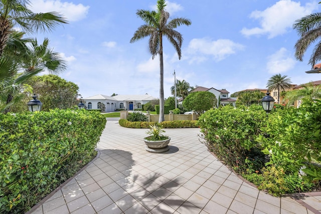 view of property's community featuring a patio