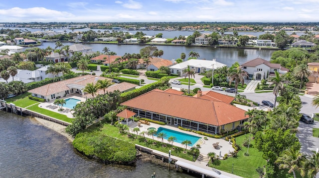 aerial view featuring a water view and a residential view