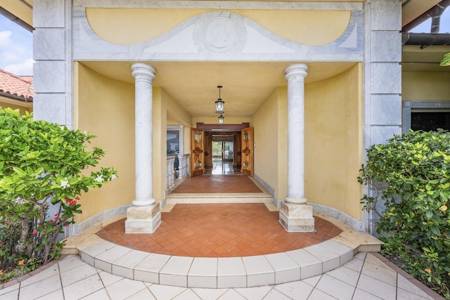 doorway to property with stucco siding