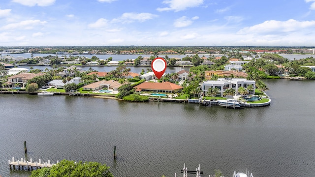 aerial view with a residential view and a water view