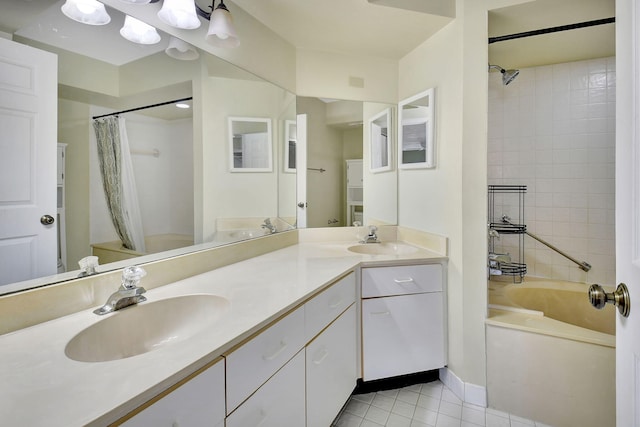 full bathroom featuring double vanity, a sink, shower / bathtub combination with curtain, and tile patterned floors