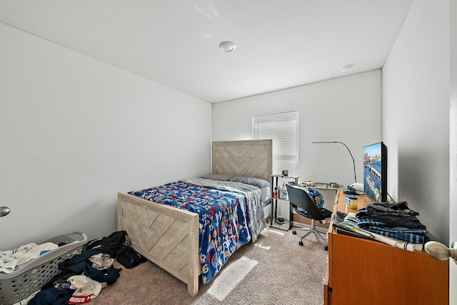 bedroom featuring carpet flooring