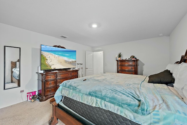 bedroom with light carpet, baseboards, and visible vents