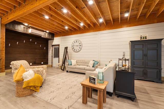 living room with a wall unit AC, light wood-style floors, and wood ceiling