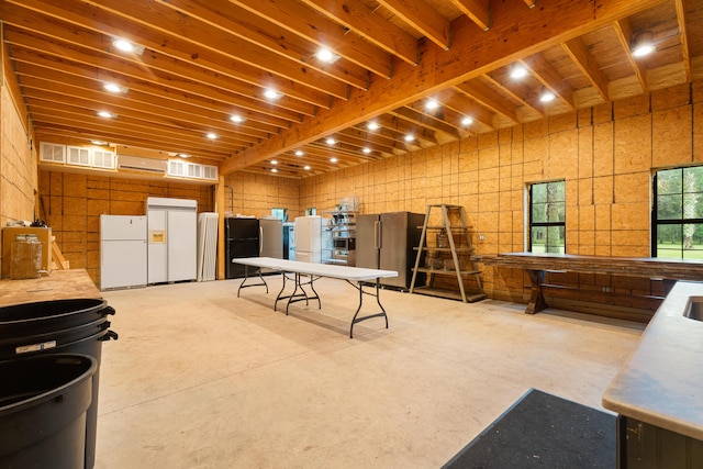 misc room with concrete flooring and visible vents