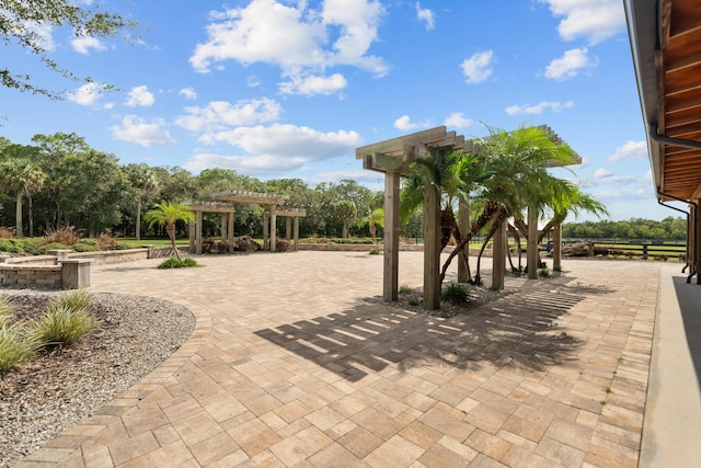 view of patio featuring a pergola