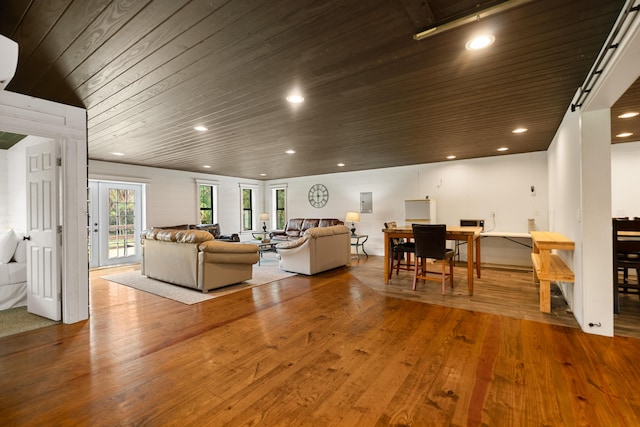 living area featuring wood ceiling, wood finished floors, and recessed lighting