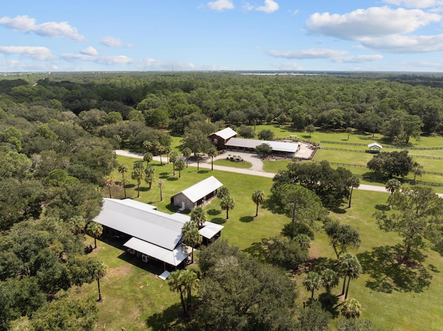 aerial view featuring a view of trees