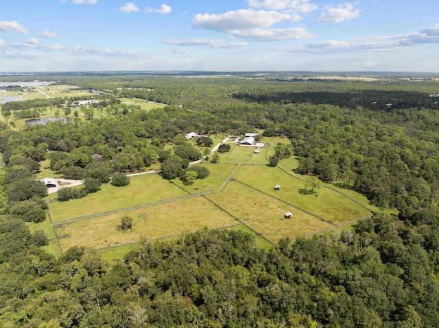 aerial view featuring a view of trees