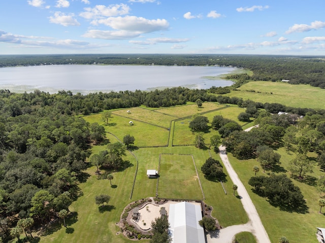 drone / aerial view featuring a water view and a rural view