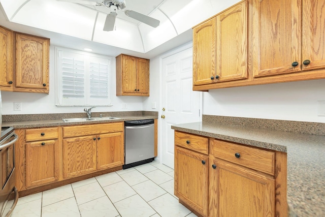 kitchen with stainless steel appliances, brown cabinetry, and a sink