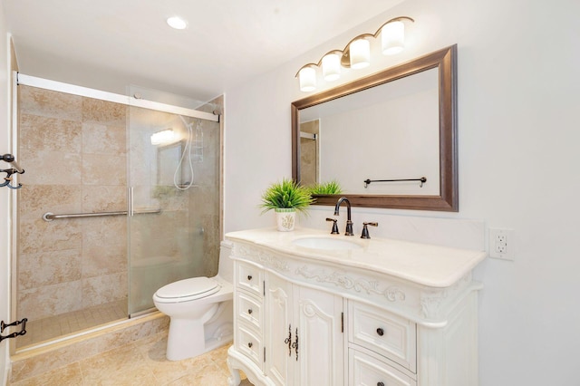 full bath featuring toilet, a shower stall, and vanity