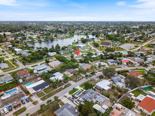 aerial view with a water view and a residential view