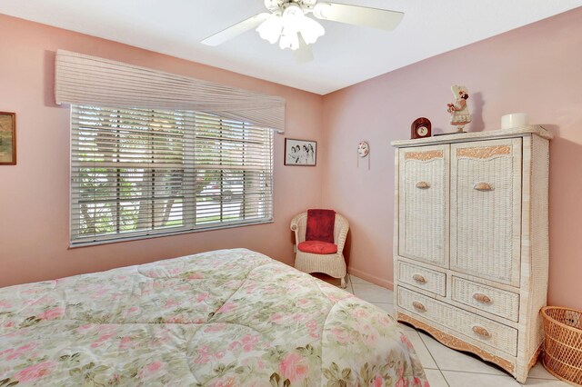 bedroom with light tile patterned floors and ceiling fan