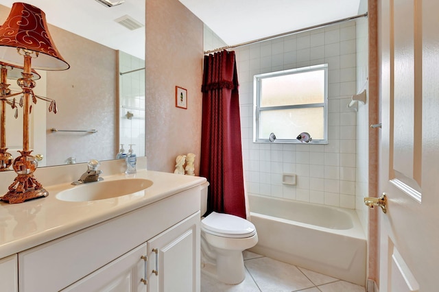 full bath featuring toilet, shower / tub combo, visible vents, vanity, and tile patterned floors