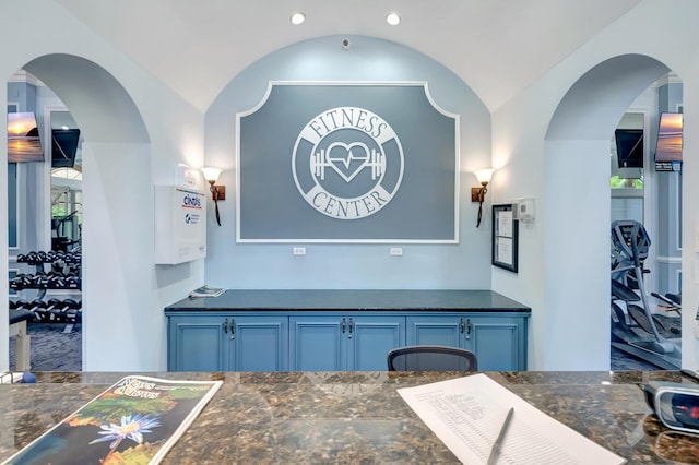 dining room with lofted ceiling