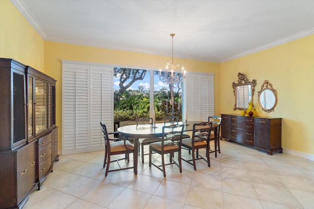 dining room with crown molding, light tile patterned floors, baseboards, and an inviting chandelier