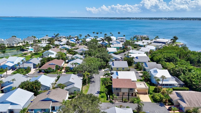 bird's eye view with a water view and a residential view