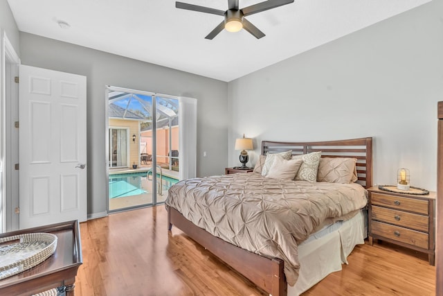 bedroom with access to exterior, a ceiling fan, and wood finished floors