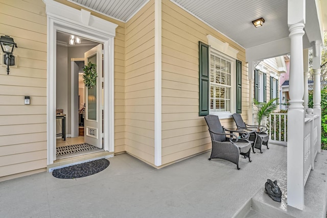 property entrance featuring covered porch