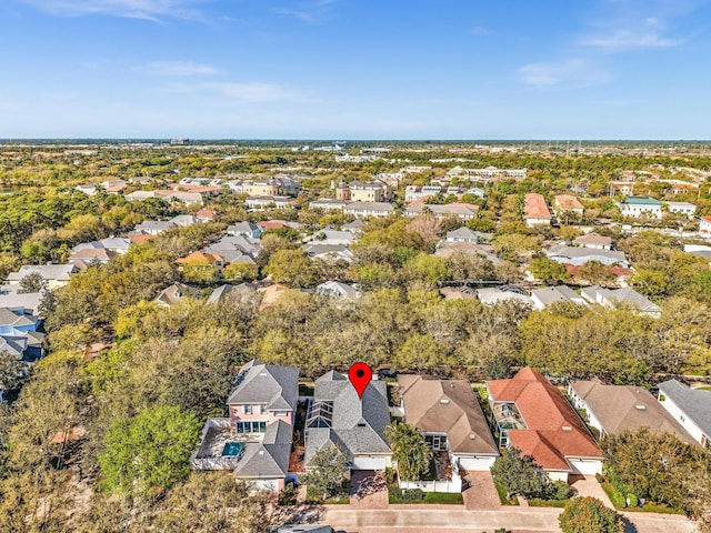 birds eye view of property with a residential view