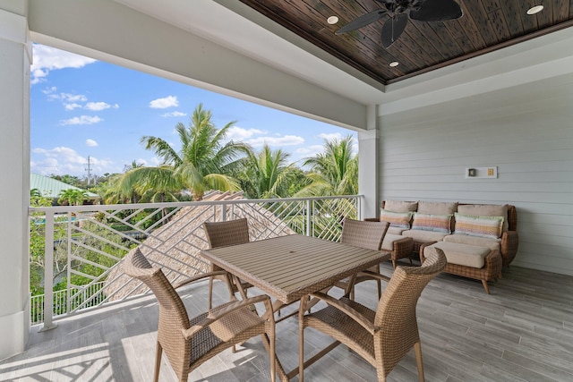 view of patio featuring an outdoor living space, a balcony, and ceiling fan