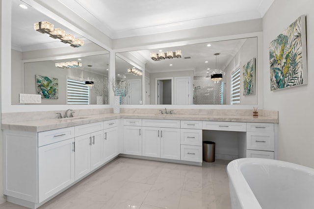 bathroom featuring marble finish floor, ornamental molding, and a sink