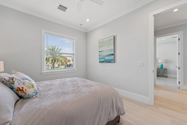 bedroom featuring visible vents, ceiling fan, baseboards, light wood-type flooring, and recessed lighting