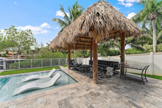 view of swimming pool with a patio area, a fenced in pool, and a fenced backyard