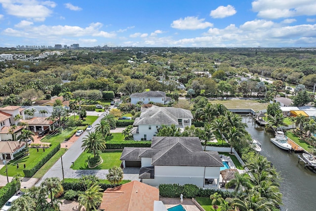 aerial view featuring a water view and a residential view