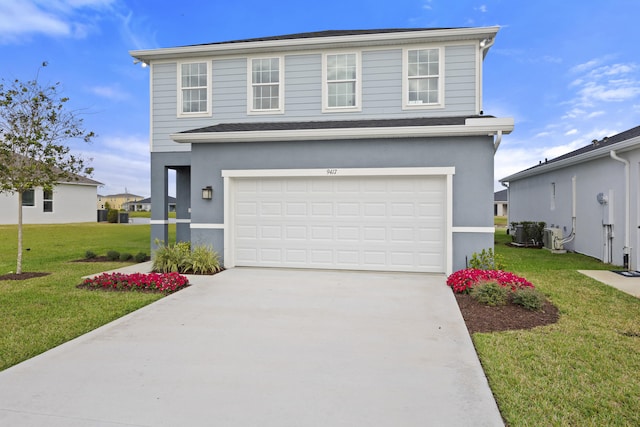 traditional-style house with a garage, stucco siding, concrete driveway, and a front yard