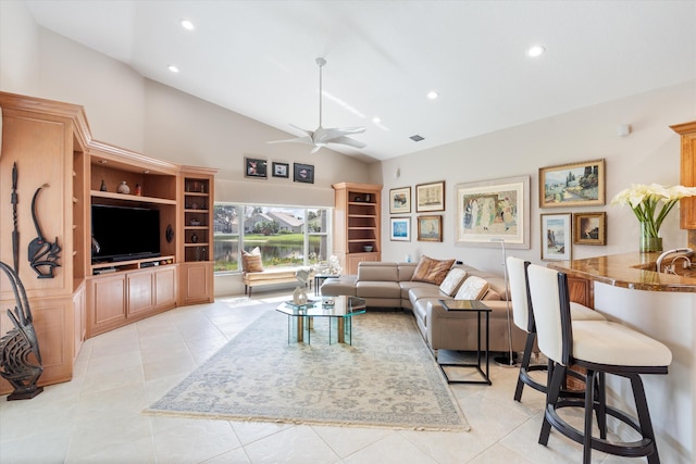 living area with recessed lighting, visible vents, a ceiling fan, light tile patterned flooring, and high vaulted ceiling