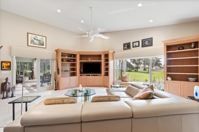 living area with high vaulted ceiling, recessed lighting, and a ceiling fan