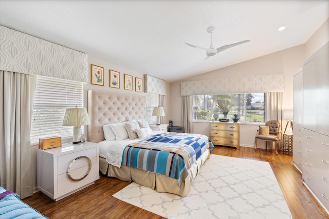 bedroom featuring ceiling fan, vaulted ceiling, and wood finished floors